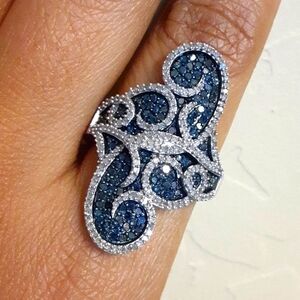 925 Genuine Blue and White Diamonds.  FIRM.